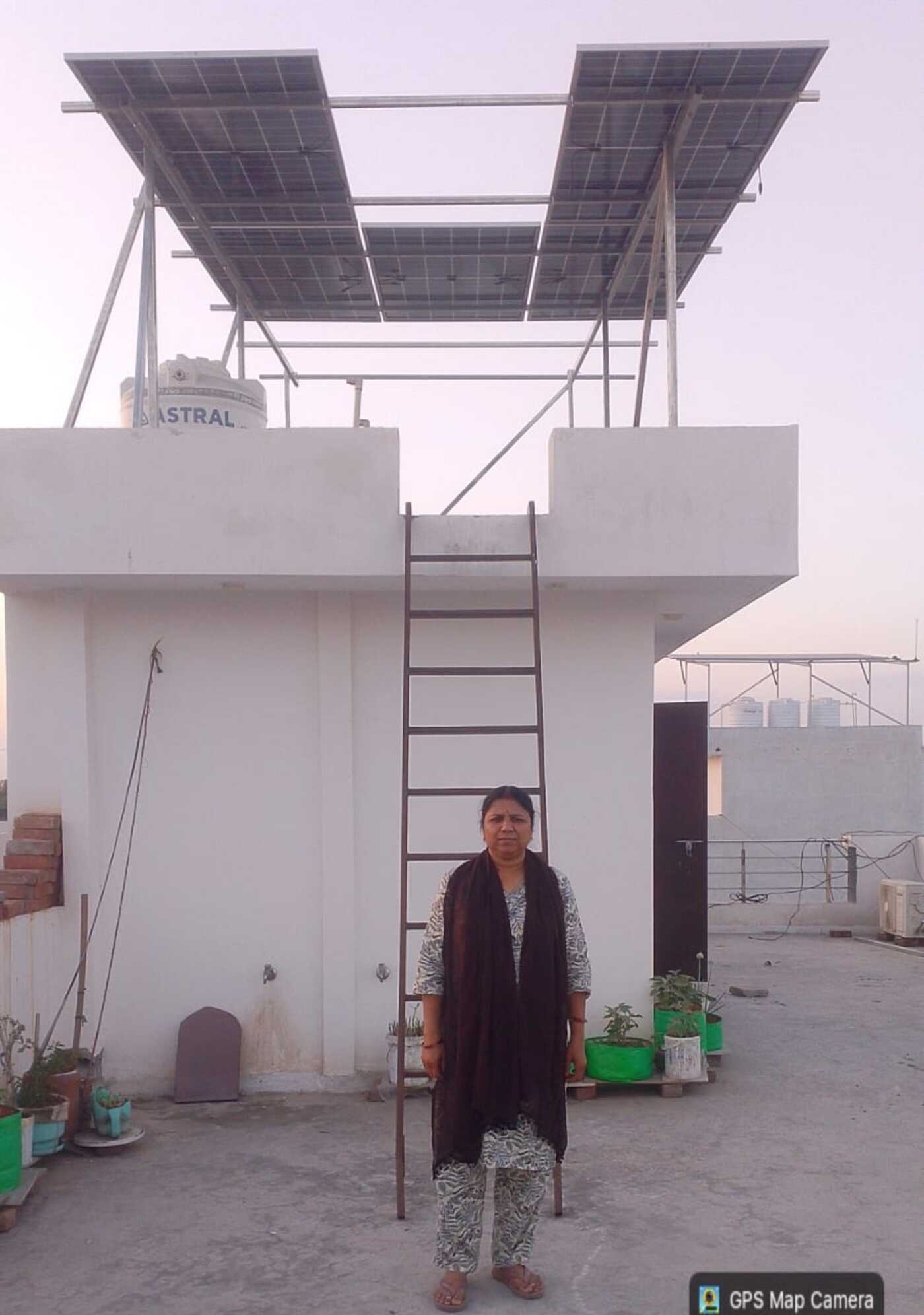 KPD Solar customer at her rooftop solar system in Kota